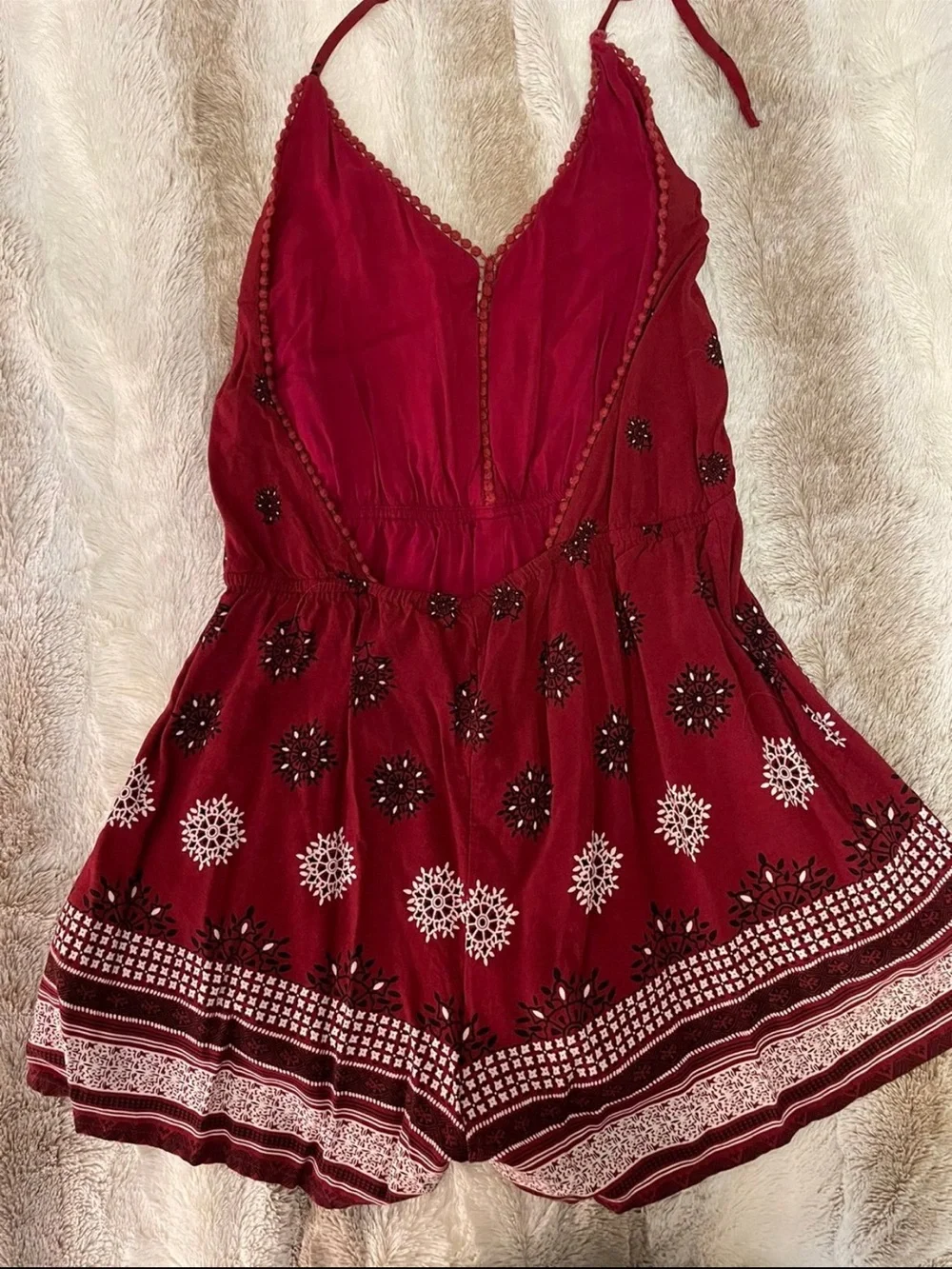 Size Medium Women’s Burgundy Printed Romper with V-Neck